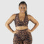 Leopard sports bra, cheetah sports bra, cheetah leggings. Best sports bra for comfort. Best activewear online for women. Sports wear with plus size women in mind. Wearing scrunch booty leggings in leopard cheetah print.