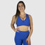 Best sports bra for comfort. Best activewear online for women. Sports wear with plus size women in mind. Wearing scrunch booty leggings in Blue.
